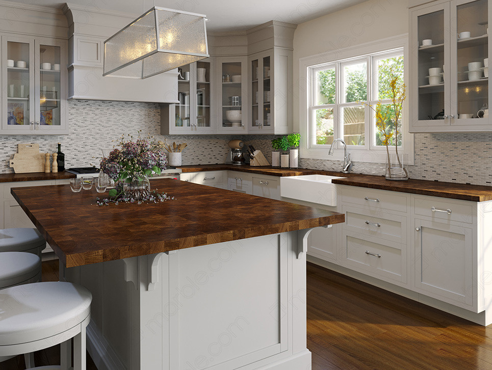 Butcher block countertop with white cabinets